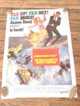A reproduction James Bond 'On Her Majesty's Secret Service' one sheet poster, Style B. Approx.