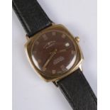 A Sully Special 25 jewel wristwatch with black leather strap, brown face with baton markers.