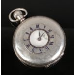 A silver half hunter pocket watch assayed Birmingham 1920 Dennison Watch Case Co. Face having