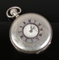 A silver half hunter pocket watch assayed Birmingham 1920 Dennison Watch Case Co. Face having