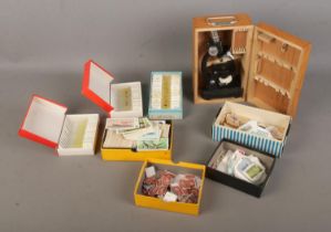 A quantity of mixed collectables to include Brooke Bond cigarette cards, British stamps including