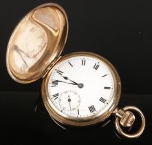 A gold plated swiss made Elgin full hunters pocket watch with roman numeral dial. Cracks to face and