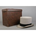 A Moss Bros grey top hat, housed in Dunn & Co box, bearing Cole Brothers label.