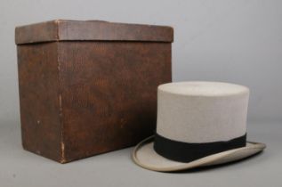 A Moss Bros grey top hat, housed in Dunn & Co box, bearing Cole Brothers label.