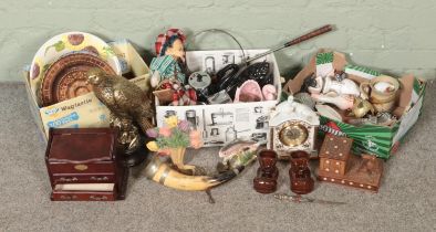 Three boxes of mixed of collectables including a vintage puppet, eagle figurine, novelty cigarette