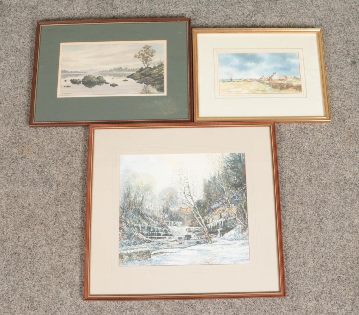 A collection of three good quality watercolours of countryside themes including examples by J