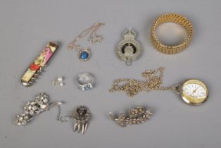 A collection of mostly costume jewellery to include brooches, floral ring, pendant on chain