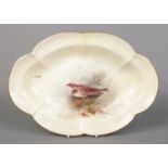 James Stinton for Royal Worcester, a porcelain lobed dish with hand painted scene depicting a Sand