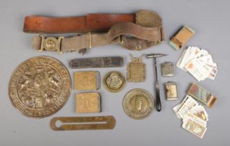 An assortment of collectables, to include brass safe plates, JS Richard razor, Wills cigarette cards