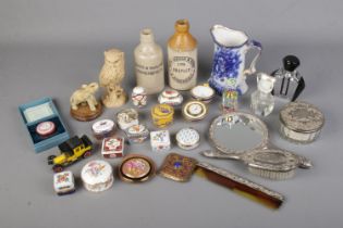 A box of assorted collectables to include DelPrado trinkets boxes, white metal dressing table set,