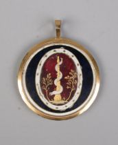 A 19th century mourning brooch with intricate enamel decoration depicting an entwined serpent.