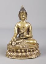 A 19th century Sino Tibetan bronze devotional statue of a seated Buddha raised on lotus plinth.