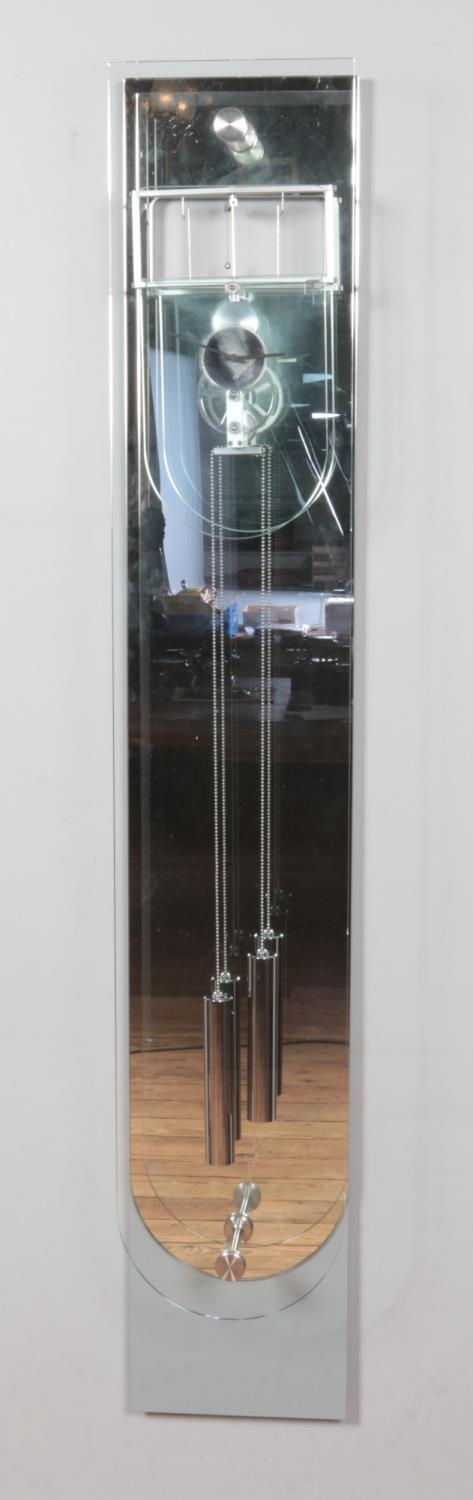 An Italian Gallotti & Radice mirrored wall clock. Length 180cm. - Image 3 of 3