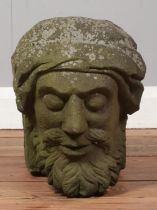A carved stone corbel, formed as the bust of a gentleman. Length 51cm, Height 28cm.