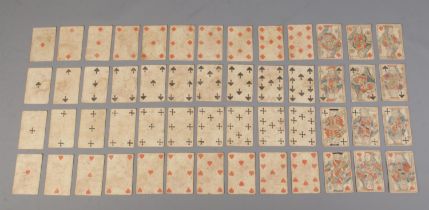 A full deck of 18th century hand painted playing cards.