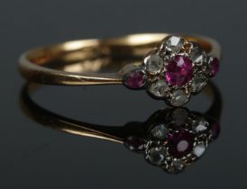 An 18ct gold and diamond cluster ring. Size O. 1.67g.