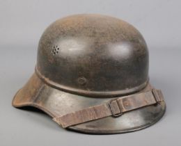 A German Luftschutz M38 gladiator helmet.
