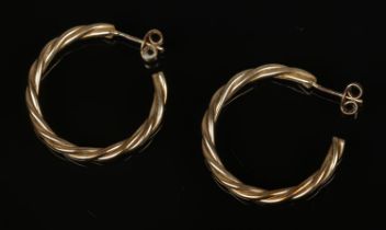 A pair of 9ct gold twisted hoop earrings. Total weight 4g.