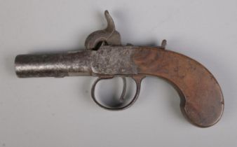 A 19th century Wallis percussion cap pistol with cylindrical barrel. Length 15.5cm. CANNOT POST