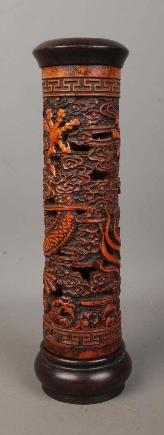 A Chinese wooden incense holder with carved decoration depicting dragons. Height 25cm. - Image 2 of 4