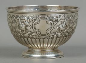 A Victorian silver pedestal bowl with repousse decoration. Assayed London 1893 by John Bodman