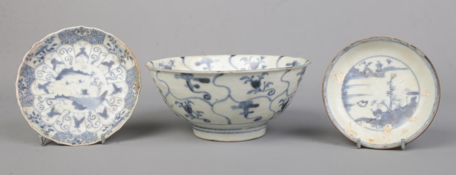 Three antique pieces of Chinese blue and white porcelain. Includes Tek Sing treasures bowl and two