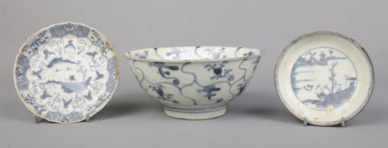 Three antique pieces of Chinese blue and white porcelain. Includes Tek Sing treasures bowl and two