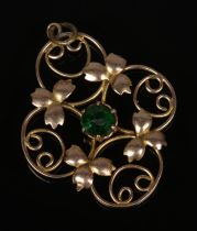 A 9ct gold Edwardian pendant set with single emerald coloured stone. Total weight 1.8g.