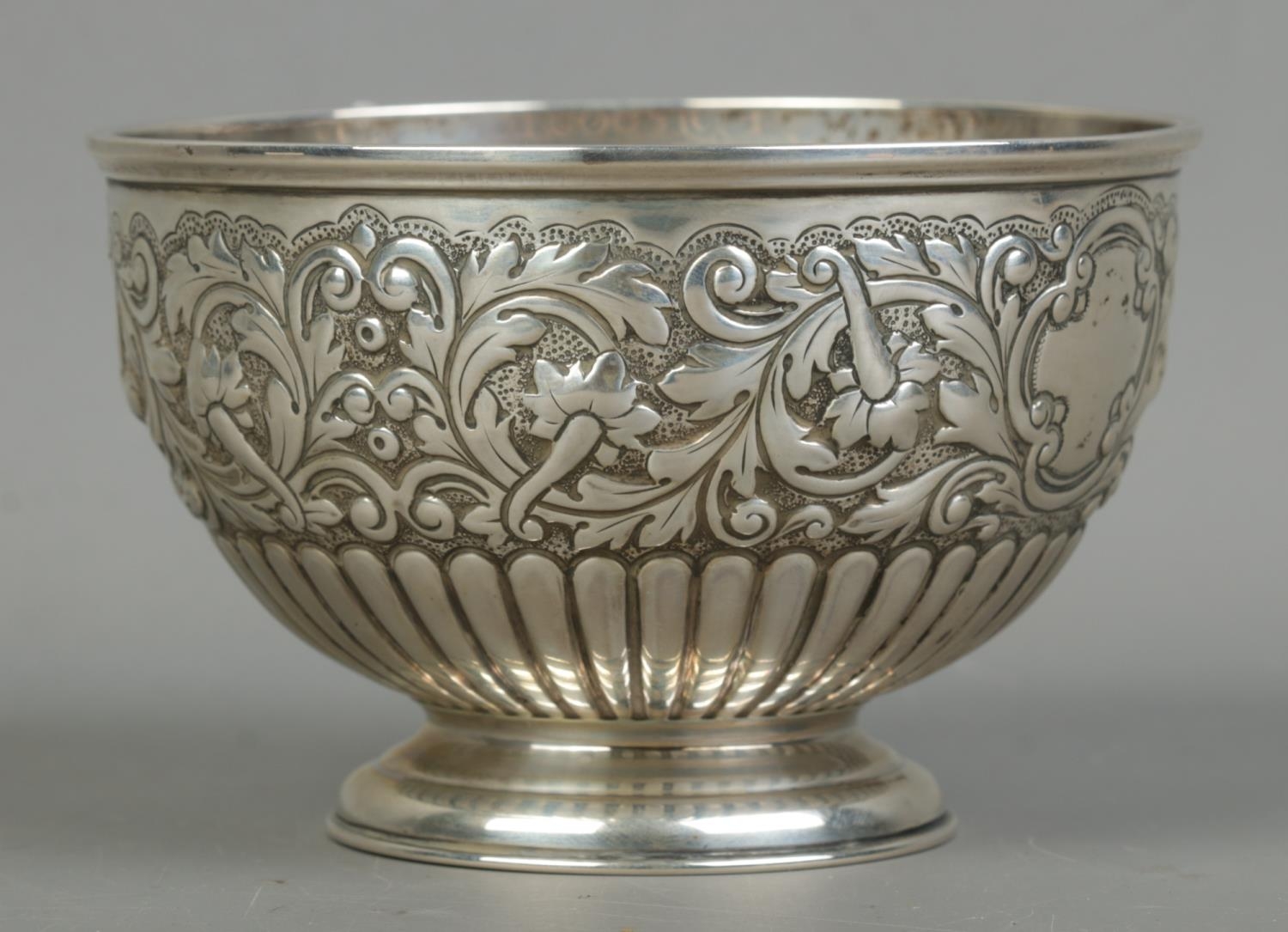 A Victorian silver pedestal bowl with repousse decoration. Assayed London 1893 by John Bodman - Image 2 of 3