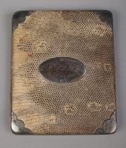 A Victorian silver mounted snakeskin pocket cigar case. Assayed Birmingham 1894. 14cm x 12cm.