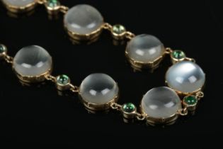 A 9ct gold moonstone and emerald coloured necklace, set with alternating cabochon stones.