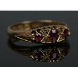 An early 20th century 18ct gold ruby and diamond ring. Size N. 2.62g.