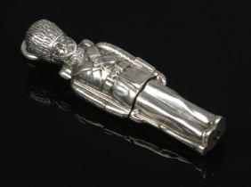 A novelty silver propelling pencil in the form of a soldier/Queen's Guard. Length 5.5cm. Gross