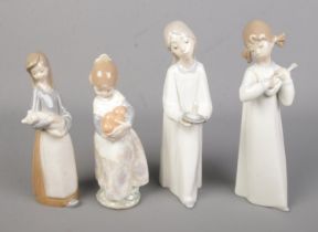 Four Lladro ceramic figures to include Valencia Girl with basket of oranges and Girl with Pig. One