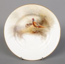 James Stinton for Royal Worcester, a porcelain plate with hand painted scene depicting pheasants