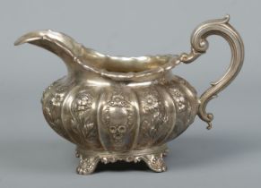 A William IV heavy gauge silver cream jug. Assayed London 1833 by Richard Pearce & George Burrows.