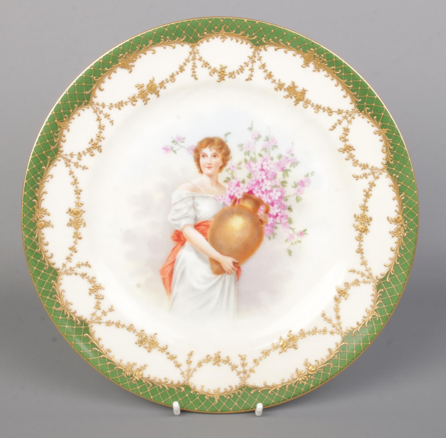 A pair of Vienna porcelain plates. With scenes depicting maidens with flowers and having green and - Image 3 of 4