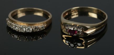 Two 9ct gold rings to include example set with garnet and diamonds (Size P½) along with clear