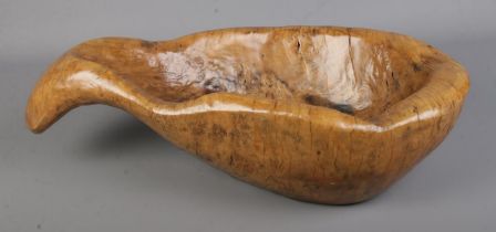 A rustic carved Indian Parat dough bowl. Approx. dimensions 54cm x 28cm x 14cm.