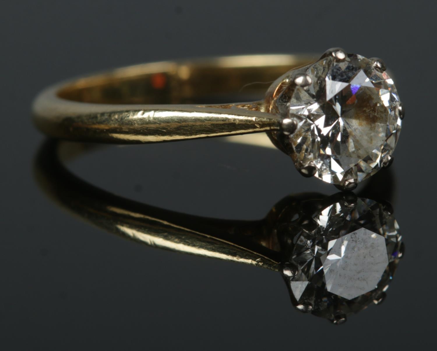 An 18ct gold diamond solitaire ring. Diamond approximately 1.25ct. Assay marks for London 1985. Size