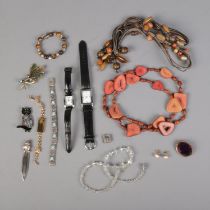 A collection of assorted costume jewellery and accessories to include a vintage coral slice