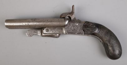 A 19th century Continental double barrel percussion pistol. Length 19cm. CANNOT POST OVERSEAS.