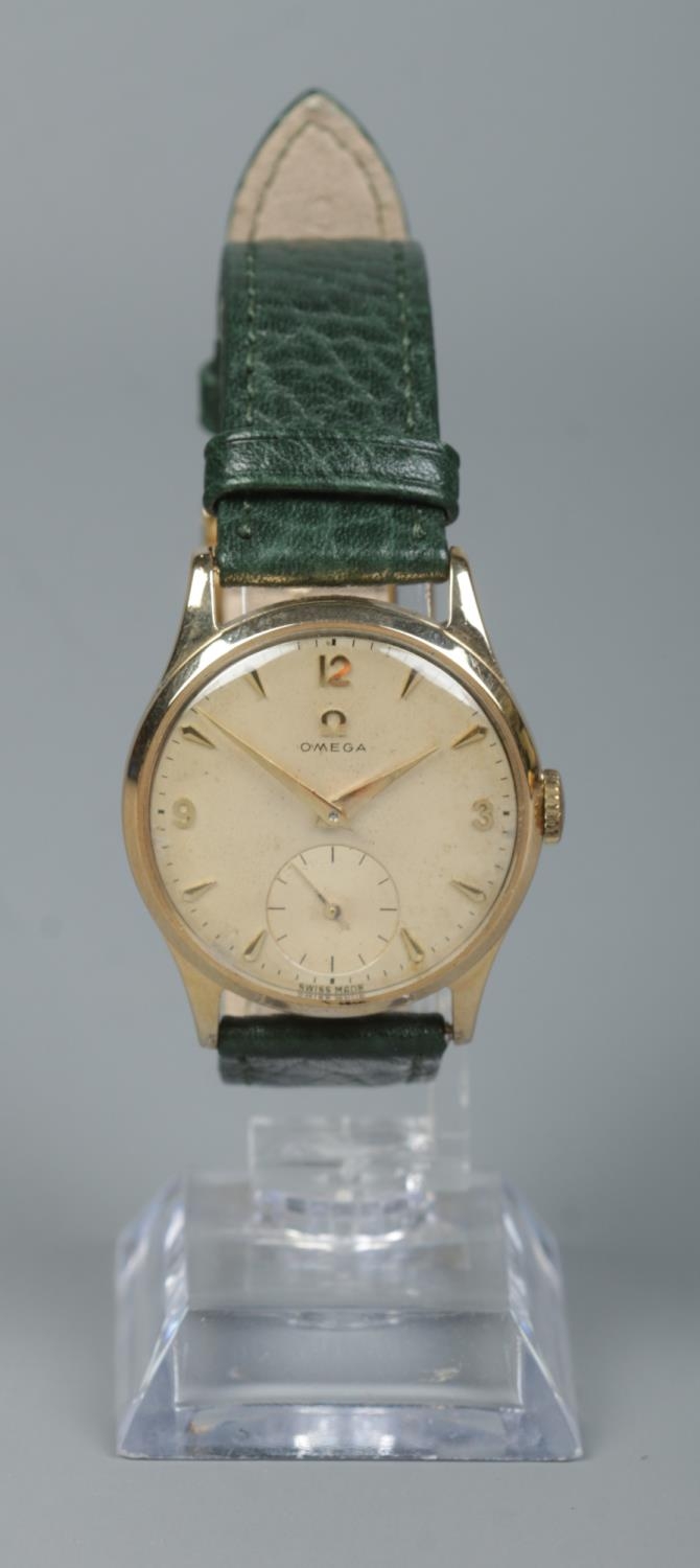 A gents 9ct gold Omega manual wristwatch. Having subsidiary seconds and baton and Arabic numeral - Image 2 of 3
