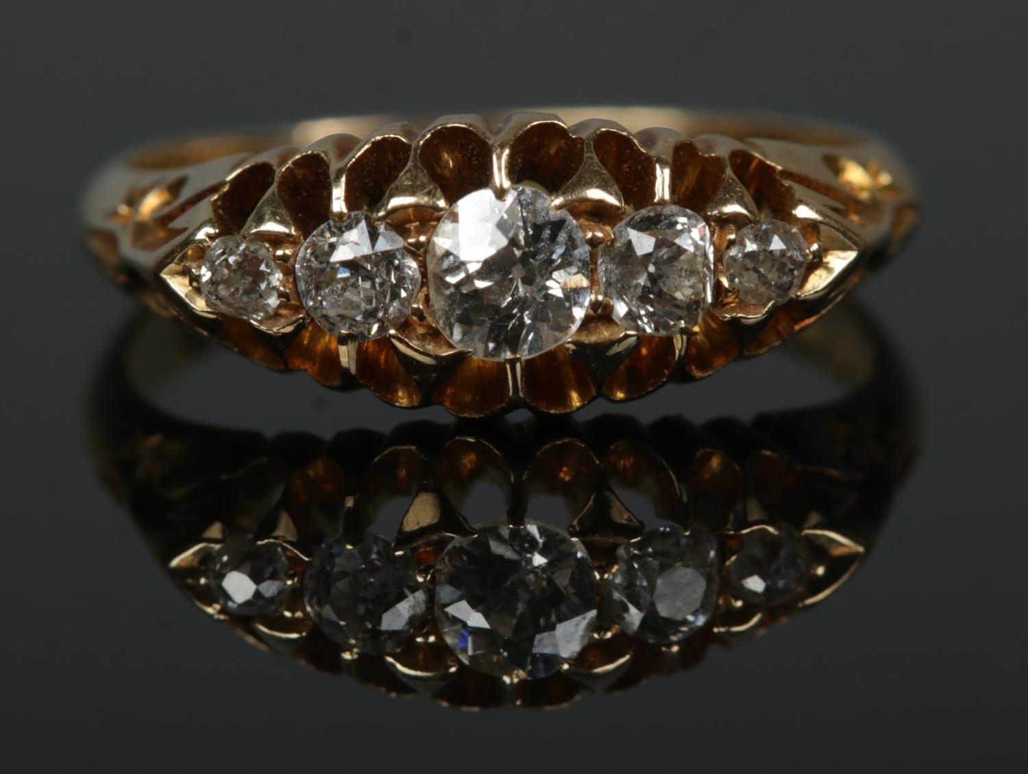 An early 20th century 18ct gold five stone diamond ring in claw setting. Size N. 3.51g. - Image 2 of 2
