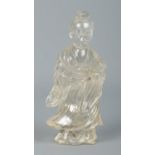A Chinese rock crystal sculpture of Guanyin. Height 13cm. Small chips and cracks to outside.