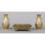 A pair of Oriental bronze lobed baluster vases along with a similar bonsai planter. Height of