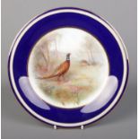James Stinton for Grainger & Co Worcester, a porcelain plate with hand painted woodland scene and