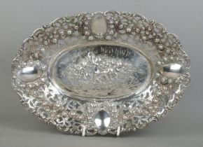 An early 20th century German silver dish. Having pierced and floral border and central panel