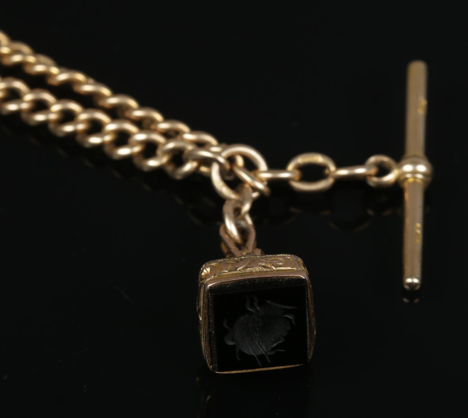 A 9ct gold Albert chain with seal fob and T-bar. Approximate length 45cm. 46.2g (without fob). - Image 2 of 3