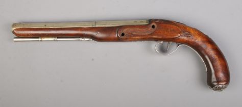 A 19th century flintlock pistol, marked for Mackingtosh London. Having white metal barrel, trigger